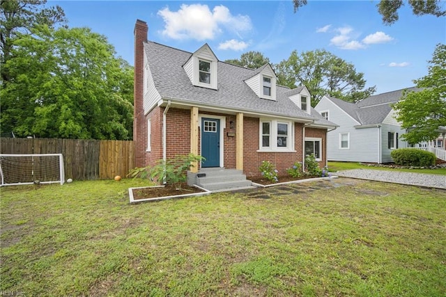 8715 Semmes Ave, Norfolk, VA 23503 - cape cod home with brick siding, a chimney, and a shingled roof