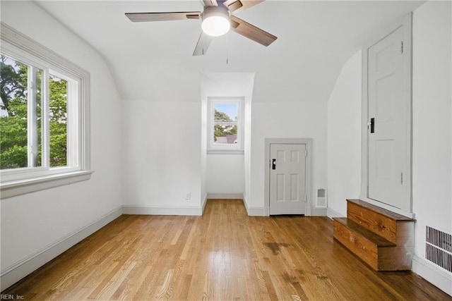 8715 Semmes Ave, Norfolk, VA 23503 - additional living space featuring vaulted ceiling, light wood-style floors, ceiling fan, and baseboards