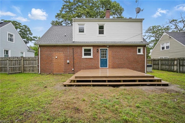 8715 Semmes Ave, Norfolk, VA 23503 - back of house featuring brick siding, a deck, a chimney, central AC, and roof with shingles