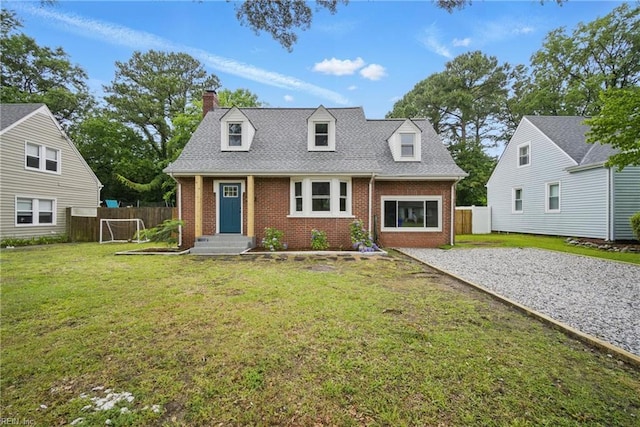 8715 Semmes Ave, Norfolk, VA 23503 - cape cod house with brick siding, a chimney, driveway, and roof with shingles