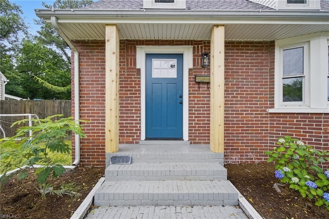 8715 Semmes Ave, Norfolk, VA 23503 - property entrance featuring brick siding and a shingled roof