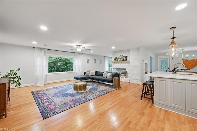 4629 Hermitage Rd, Virginia Beach, VA 23455 - living room featuring ceiling fan, light wood finished floors, a large fireplace, baseboards, and recessed lighting