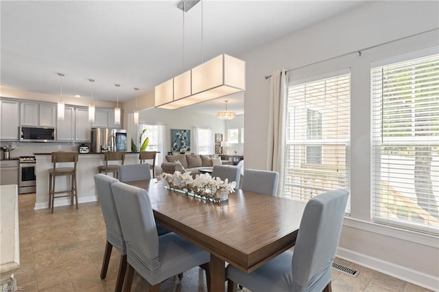 1025 Sullivan Ln, Chesapeake, VA 23322 - dining space featuring healthy amount of natural light and baseboards