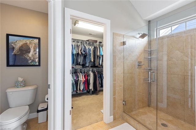 1025 Sullivan Ln, Chesapeake, VA 23322 - full bath featuring toilet, a stall shower, a spacious closet, and baseboards