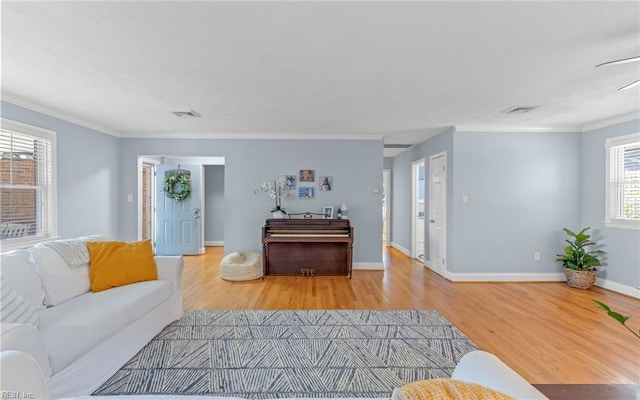 912 Marque Ct, Virginia Beach, VA 23464 - living area featuring wood finished floors, ornamental molding, and baseboards