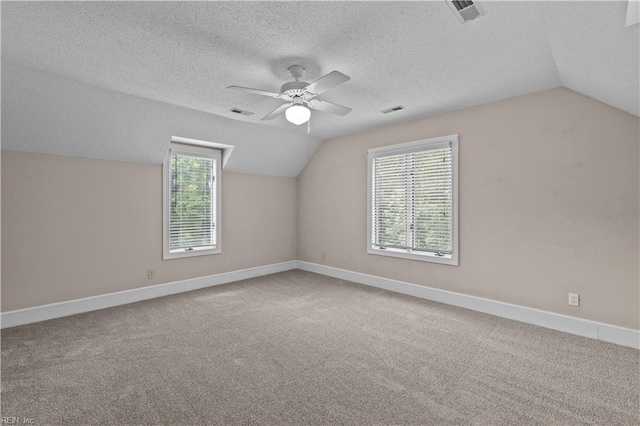400 Discovery Rd, Virginia Beach, VA 23451 - bonus room featuring lofted ceiling, a ceiling fan, a textured ceiling, carpet floors, and baseboards