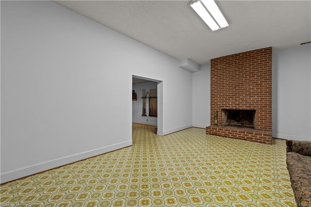 400 Discovery Rd, Virginia Beach, VA 23451 - unfurnished living room featuring baseboards and a fireplace