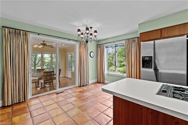 400 Discovery Rd, Virginia Beach, VA 23451 - kitchen with stainless steel fridge, stovetop, healthy amount of natural light, and light tile patterned flooring