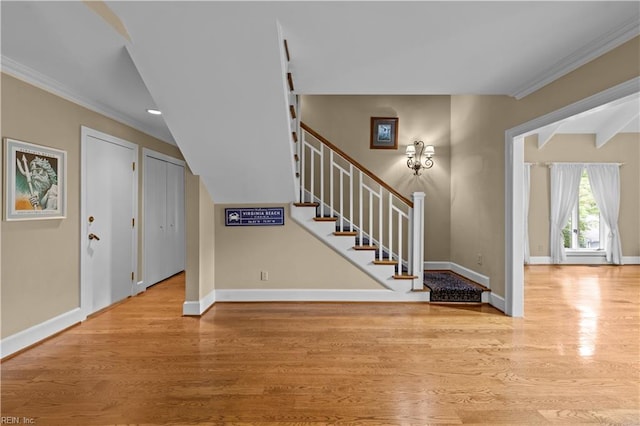 400 Discovery Rd, Virginia Beach, VA 23451 - stairway with wood finished floors, baseboards, ornamental molding, vaulted ceiling, and recessed lighting
