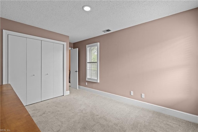 400 Discovery Rd, Virginia Beach, VA 23451 - unfurnished bedroom with carpet flooring, a textured ceiling, a closet, baseboards, and recessed lighting