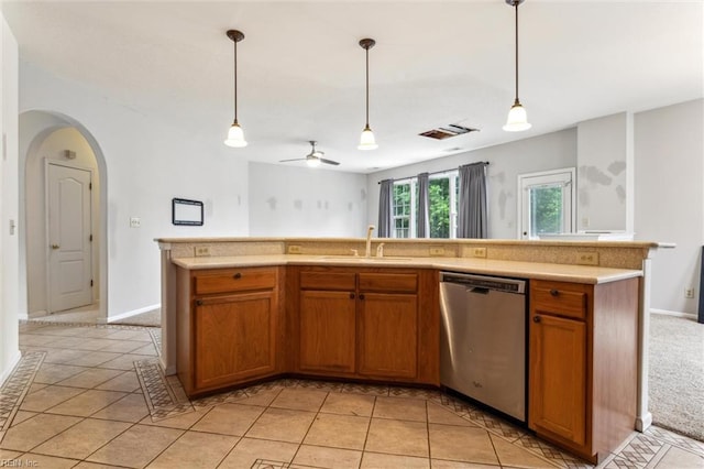 109 Lenora Cv, Smithfield, VA 23430 - kitchen with dishwasher, a sink, brown cabinets, light countertops, and decorative light fixtures