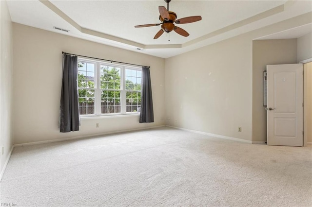 109 Lenora Cv, Smithfield, VA 23430 - carpeted spare room with ceiling fan, a tray ceiling, and baseboards