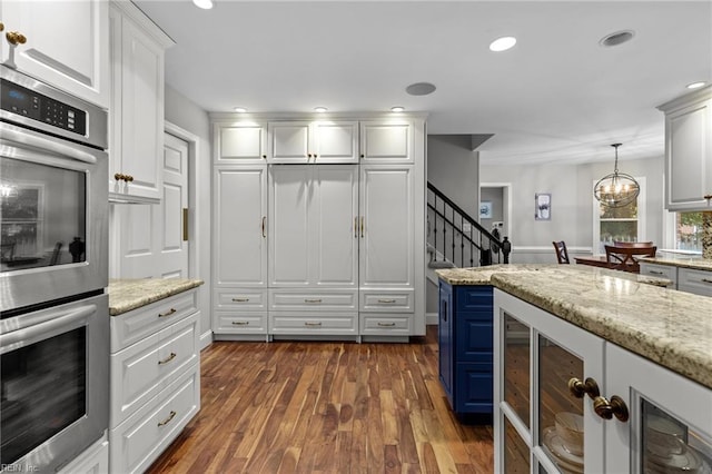 3121 Audley Way, Virginia Beach, VA 23452 - kitchen with stainless steel double oven, wine cooler, white cabinetry, recessed lighting, and dark wood-type flooring