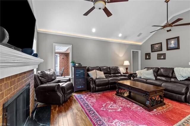 3121 Audley Way, Virginia Beach, VA 23452 - living room with ceiling fan, a brick fireplace, vaulted ceiling, hardwood / wood-style flooring, and recessed lighting