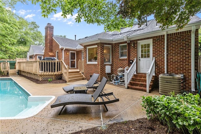 3121 Audley Way, Virginia Beach, VA 23452 - back of house with entry steps, brick siding, and central AC