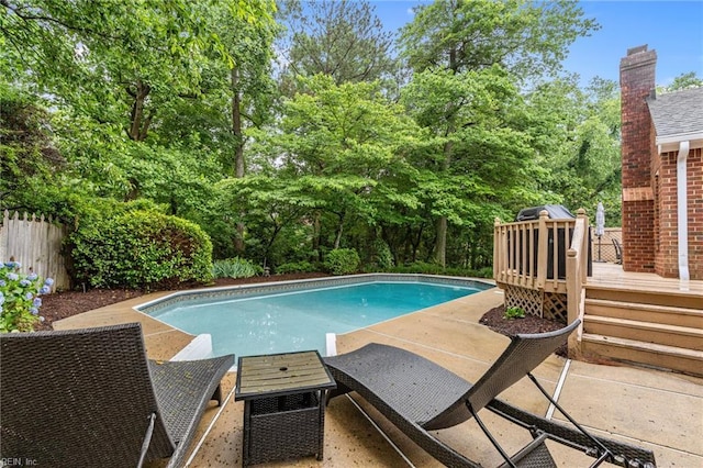 3121 Audley Way, Virginia Beach, VA 23452 - swimming pool with a deck, view of scattered trees, a patio, and a grill