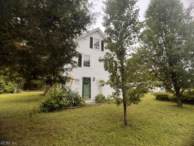 1717 Old Ferry Rd, Hudgins, VA 23076 - view of front of house featuring a front yard