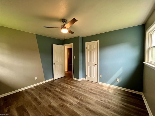 3300 Pine Hill Cres, Chesapeake, VA 23321 - unfurnished bedroom with wood finished floors, baseboards, and a ceiling fan