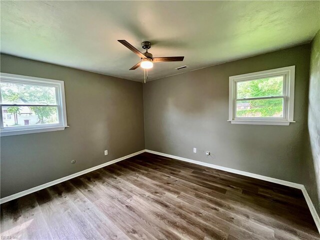 3300 Pine Hill Cres, Chesapeake, VA 23321 - spare room featuring healthy amount of natural light, baseboards, wood finished floors, and a ceiling fan