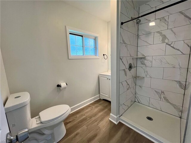 3300 Pine Hill Cres, Chesapeake, VA 23321 - full bath featuring toilet, wood finished floors, tiled shower, baseboards, and vanity