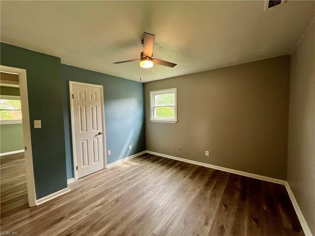 3300 Pine Hill Cres, Chesapeake, VA 23321 - spare room featuring wood finished floors, baseboards, and a ceiling fan