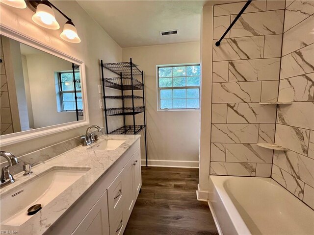 3300 Pine Hill Cres, Chesapeake, VA 23321 - full bath featuring wood finished floors, plenty of natural light, double vanity, and bathing tub / shower combination