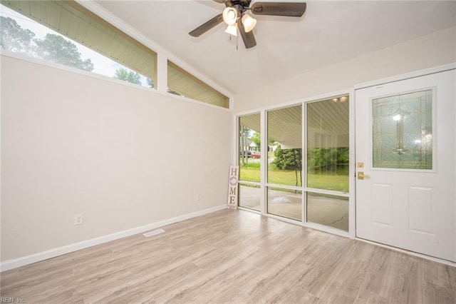 917 Garfield Ave, Suffolk, VA 23434 - spare room featuring ceiling fan, healthy amount of natural light, wood finished floors, baseboards, and vaulted ceiling