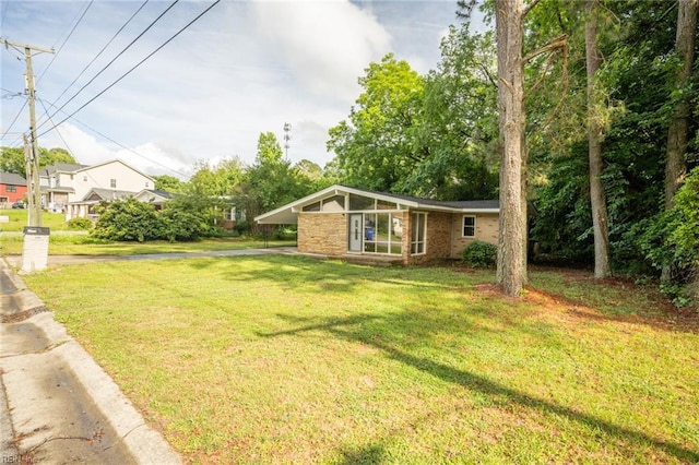 917 Garfield Ave, Suffolk, VA 23434 - view of front facade with a front lawn and brick siding