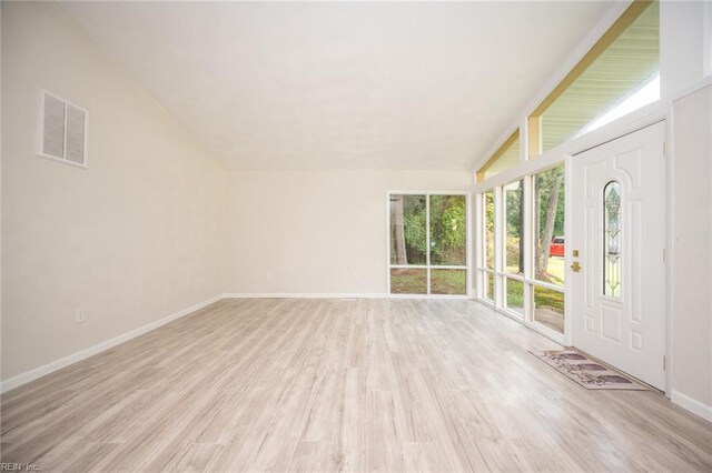 917 Garfield Ave, Suffolk, VA 23434 - foyer entrance featuring baseboards, light wood finished floors, and vaulted ceiling