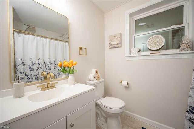 917 Garfield Ave, Suffolk, VA 23434 - full bath featuring toilet, vanity, and baseboards