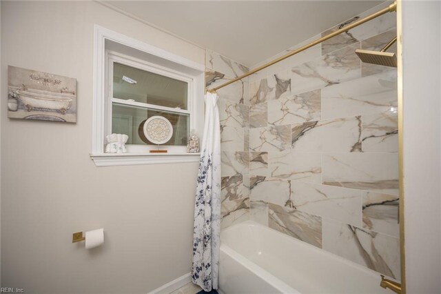 917 Garfield Ave, Suffolk, VA 23434 - bathroom featuring shower / bath combo with shower curtain and baseboards