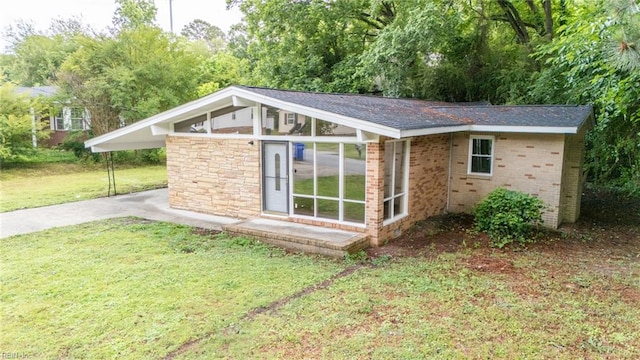 917 Garfield Ave, Suffolk, VA 23434 - view of outdoor structure with concrete driveway and a carport