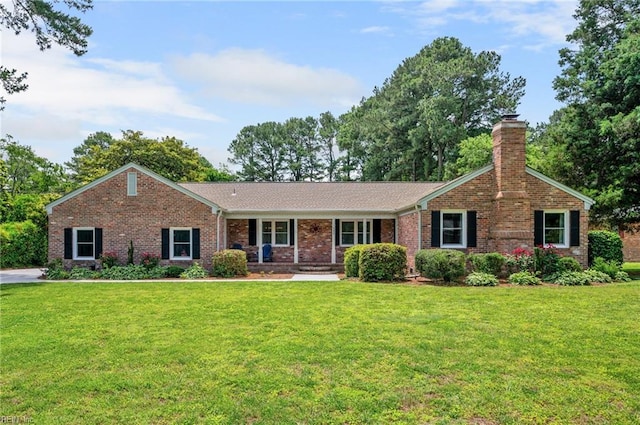 4252 Country Club Cir, Virginia Beach, VA 23455 - ranch-style home with a chimney, a front lawn, and brick siding