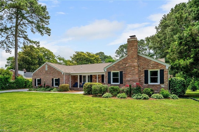 4252 Country Club Cir, Virginia Beach, VA 23455 - ranch-style house with brick siding, a chimney, and a front lawn
