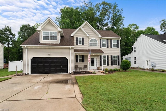 302 Peachwood Ct, Suffolk, VA 23434 - view of front of home with driveway, a front yard, a garage, and roof with shingles