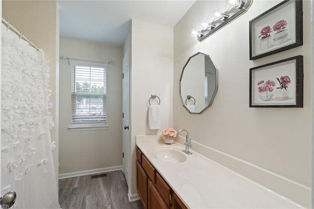 302 Peachwood Ct, Suffolk, VA 23434 - full bathroom featuring vanity, baseboards, and wood finished floors