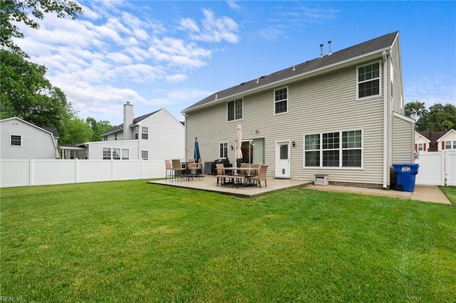 302 Peachwood Ct, Suffolk, VA 23434 - back of house with a patio area