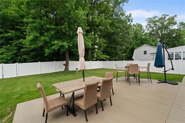 302 Peachwood Ct, Suffolk, VA 23434 - view of patio featuring outdoor dining area and view of scattered trees