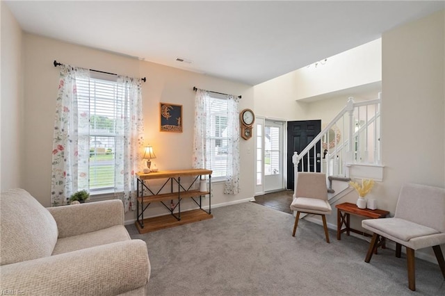 302 Peachwood Ct, Suffolk, VA 23434 - living area featuring healthy amount of natural light, stairway, carpet, and baseboards