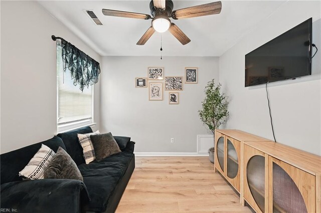 1840 Old Ridge Rd, Virginia Beach, VA 23464 - living area with light wood-style floors, a ceiling fan, and baseboards