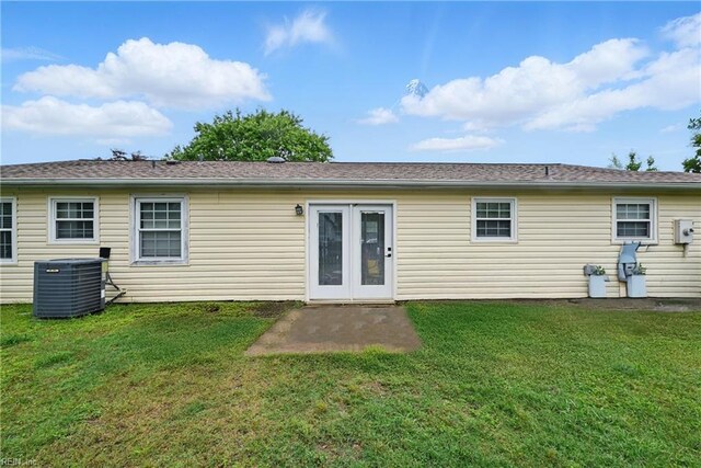1840 Old Ridge Rd, Virginia Beach, VA 23464 - rear view of house featuring central AC and a lawn
