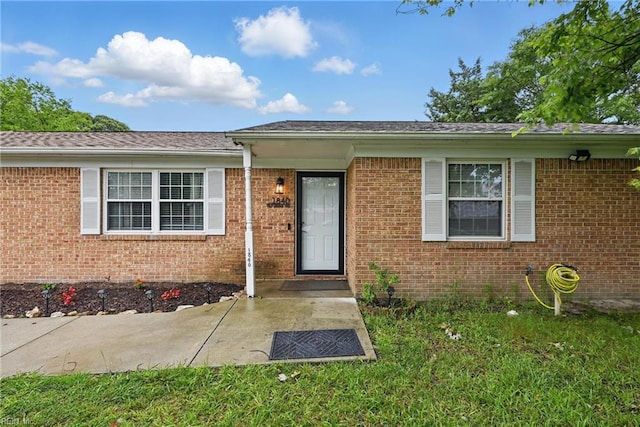 1840 Old Ridge Rd, Virginia Beach, VA 23464 - view of exterior entry with brick siding and a patio