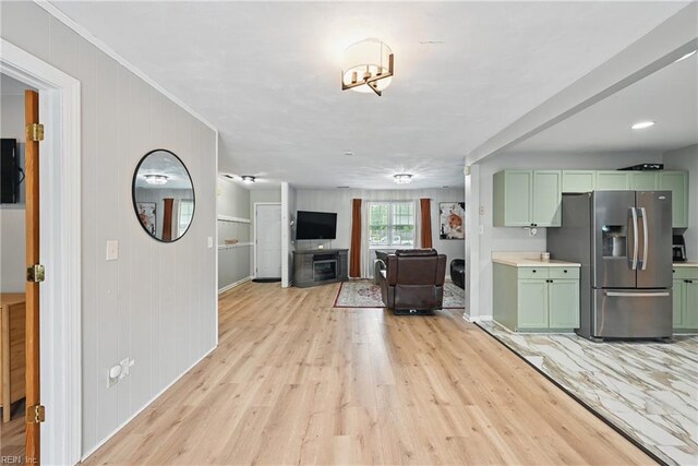 1840 Old Ridge Rd, Virginia Beach, VA 23464 - kitchen featuring green cabinets, stainless steel fridge, light wood-style flooring, light countertops, and baseboards