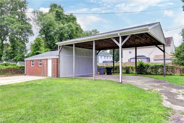 319 Greenbriar Ave, Hampton, VA 23661 - view of parking featuring a carport and driveway