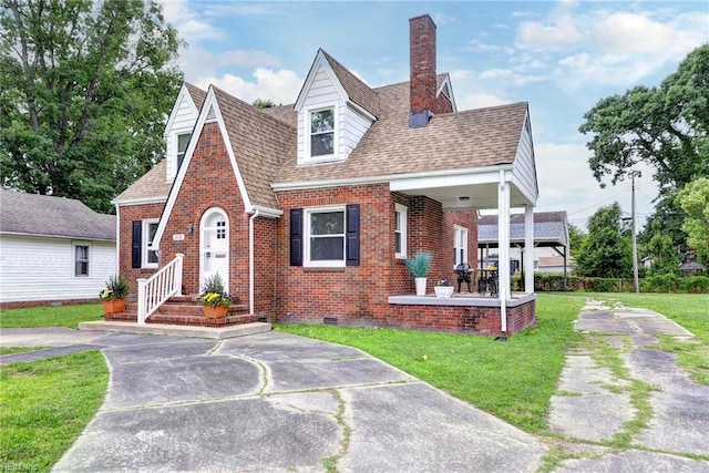 319 Greenbriar Ave, Hampton, VA 23661 - view of front of property with brick siding, crawl space, a front yard, and a chimney
