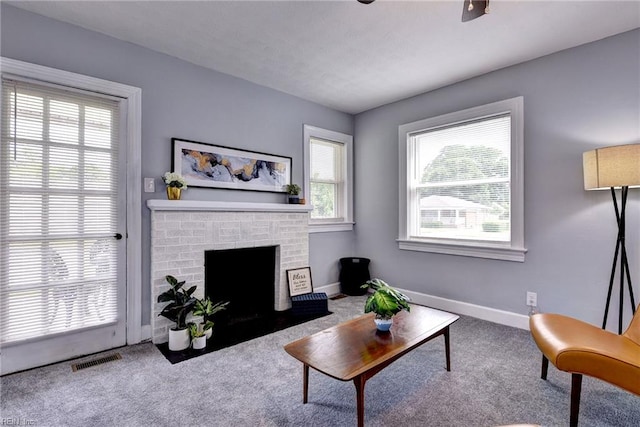 319 Greenbriar Ave, Hampton, VA 23661 - living area featuring carpet flooring, baseboards, and a fireplace
