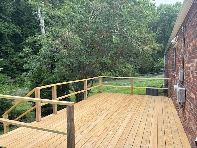 432 Maryle Ct, Newport News, VA 23602 - deck with central AC unit and a wooded view