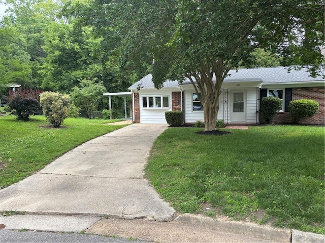 432 Maryle Ct, Newport News, VA 23602 - view of front of home with concrete driveway, brick siding, and a front yard
