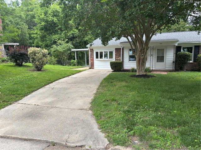 432 Maryle Ct, Newport News, VA 23602 - view of front facade featuring driveway, brick siding, a front lawn, and roof with shingles