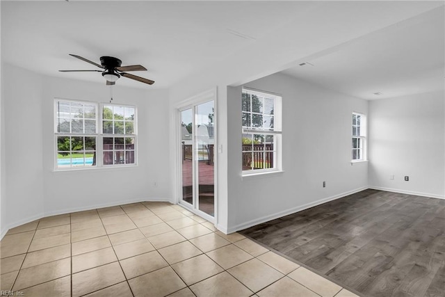 3005 Beech Grove Ln, Suffolk, VA 23435 - tiled empty room with a ceiling fan and baseboards